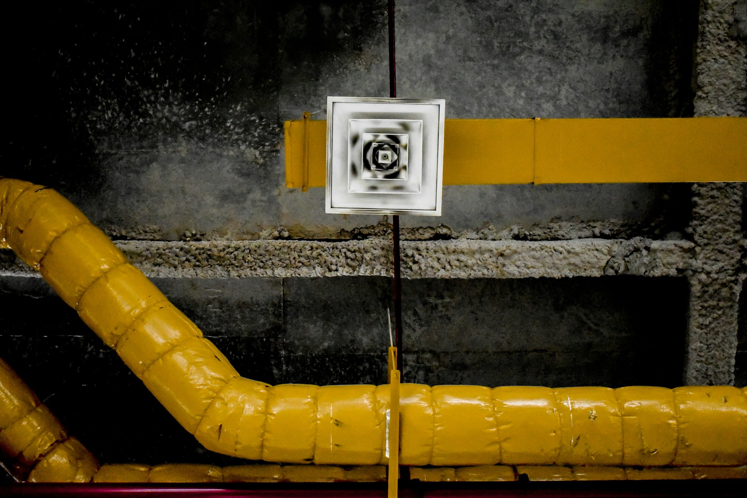 Mechanical plant ductwork and insulated piping during facilities inspection context
