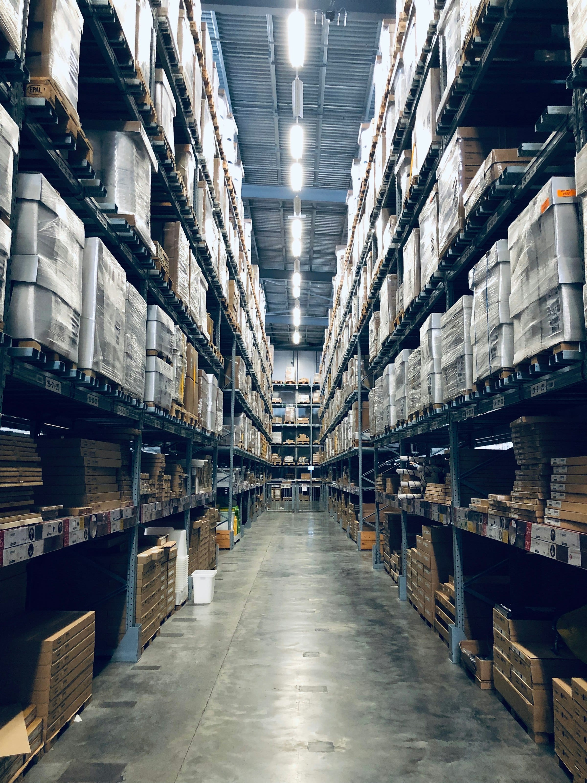 Warehouse logistics aisle with pallet racking and stored inventory